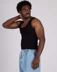 Side view of The Tank Top in Basic Black on Isaac