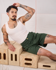 Trouser Shorts in Swamp Green and Tank Top in vintage tee off-white on Jesse