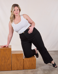 Lish is wearing Western Pants in Basic Black and Cropped Tank in Vintage Tee Off-White