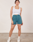 Tiara is 5’4” and wearing S Classic Work Shorts in Marine Blue paired with Cropped Tank Top in vintage tee off-white