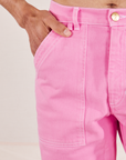 Carpenter Jeans in Bubblegum Pink front close up on Jesse.