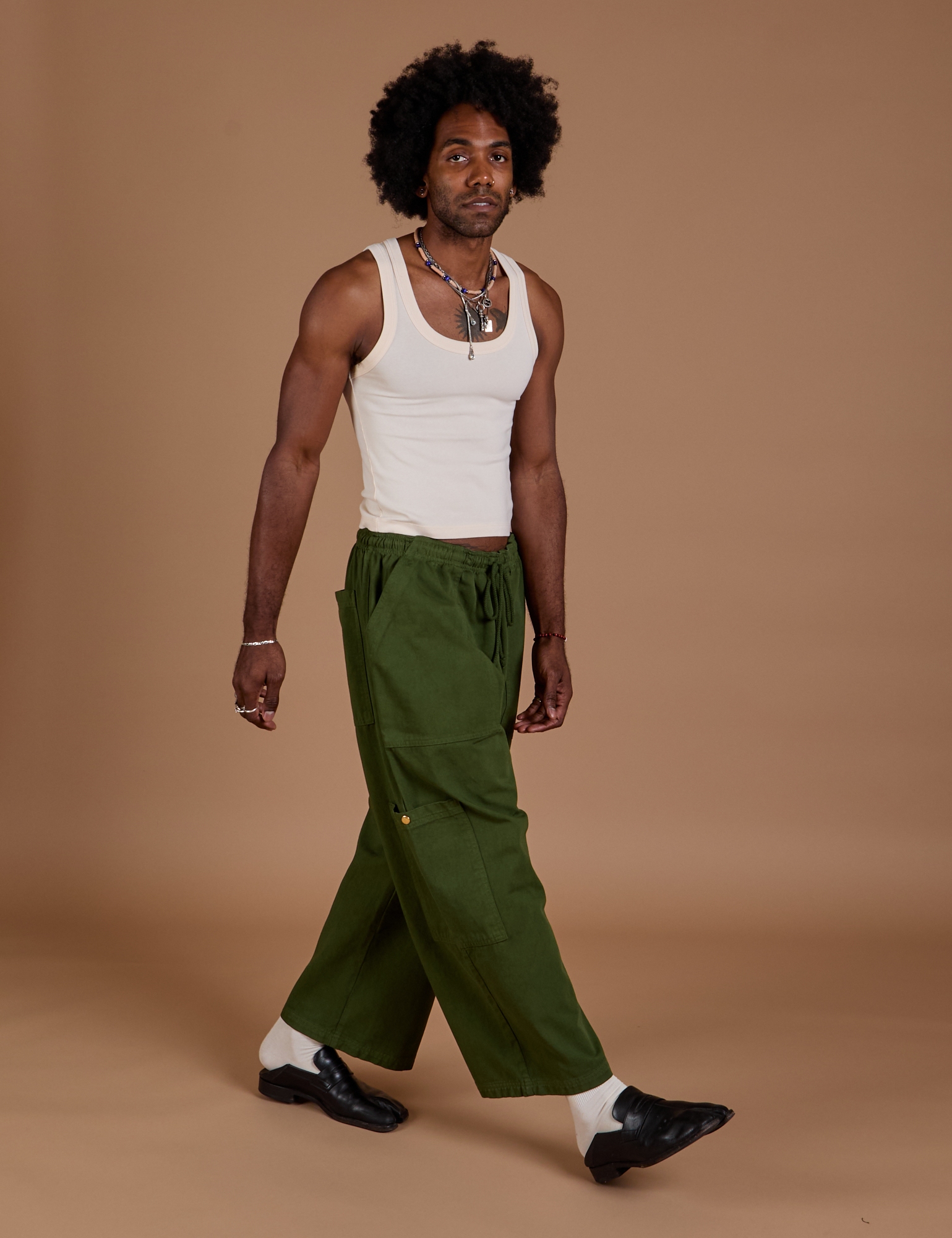 Drop Pocket Cargo Pants in Evergreen and Tank Top in vintage tee white on Jerrod