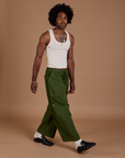 Drop Pocket Cargo Pants in Evergreen and Tank Top in vintage tee white on Jerrod