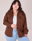 Ashley is 5'7" and wearing L Flannel Overshirt in Fudgesicle Brown