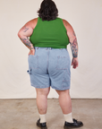 Back view of Carpenter Shorts in Light Wash and lawn green Cropped Tank on Sam