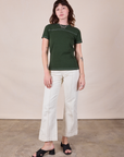 JV Tee in Swamp Green and vintage tee off-white Western Pants on Alex