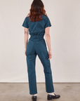 Short Sleeve Jumpsuit in Lagoon back view on Alex