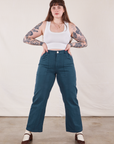 Sydney is 5'9" and wearing L Work Pants in Lagoon paired with vintage tee off-white Cropped Tank