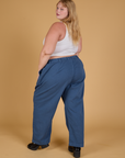 Baggy Mid-Rise Trousers in French Blue back view on Juliet
