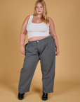 Baggy Mid-Rise Trousers in Slate Grey and vintage tee white Cropped Tank worn by Juliet