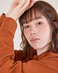 Hana is wearing Oversize Overshirt in Burnt Terracotta