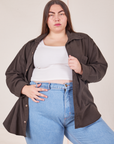 Marielena is wearing size 0XL Oversize Overshirt in Espresso Brown paired with vintage off-white Cropped Tank Top underneath