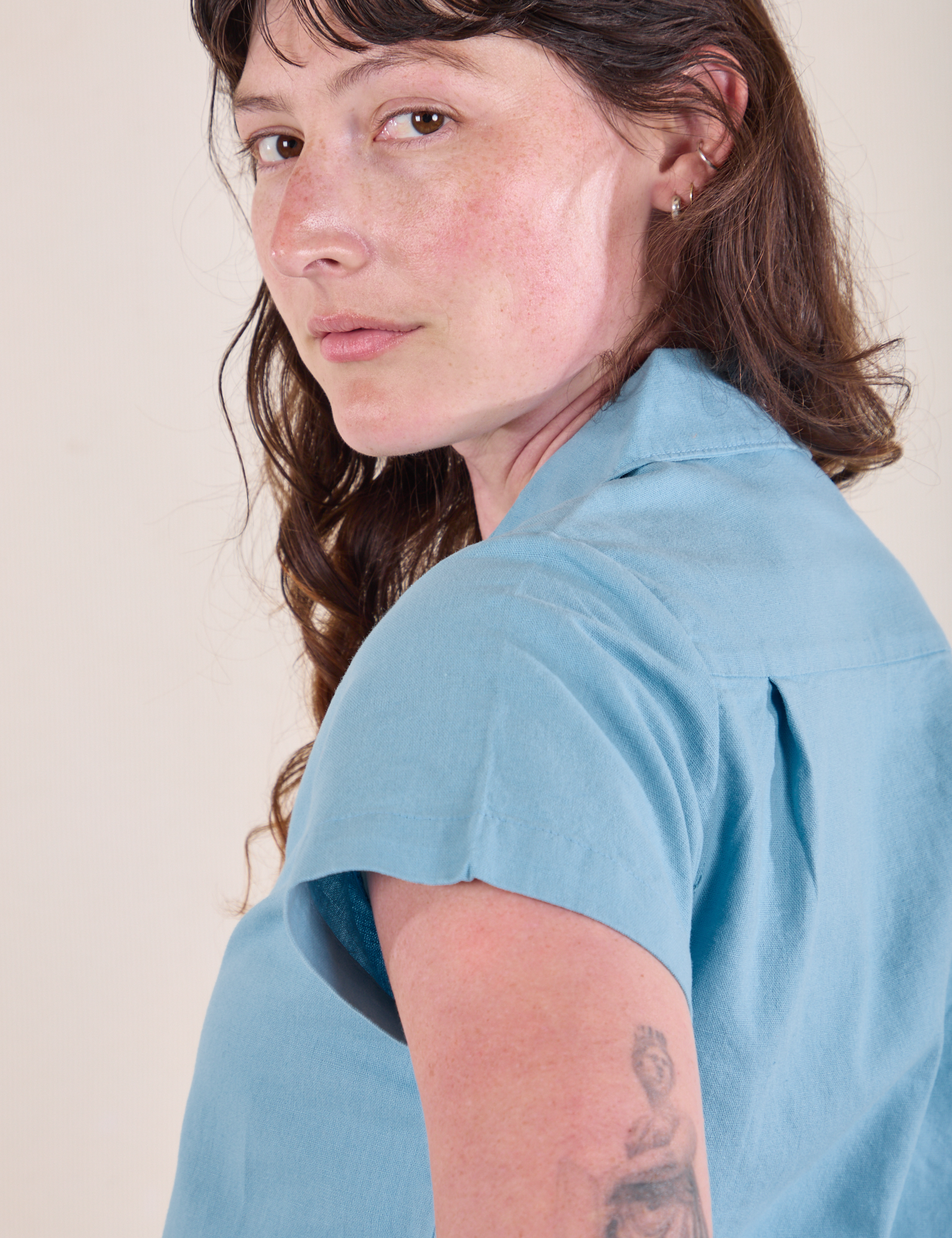 Pantry Button-Up in Baby Blue shoulder close up on Alex