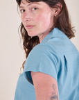 Pantry Button-Up in Baby Blue shoulder close up on Alex