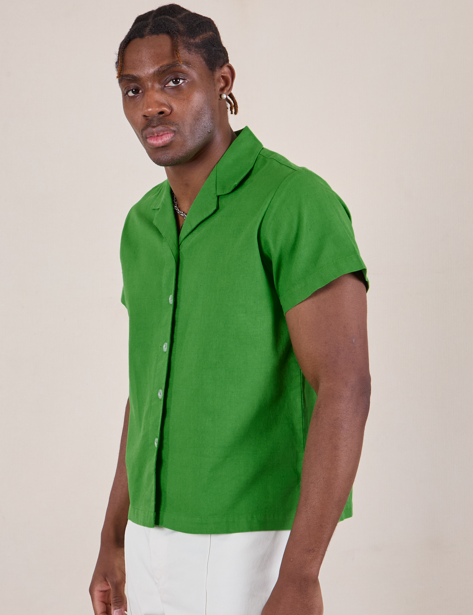 Pantry Button-Up in Kelly Green angled front view on Isaac