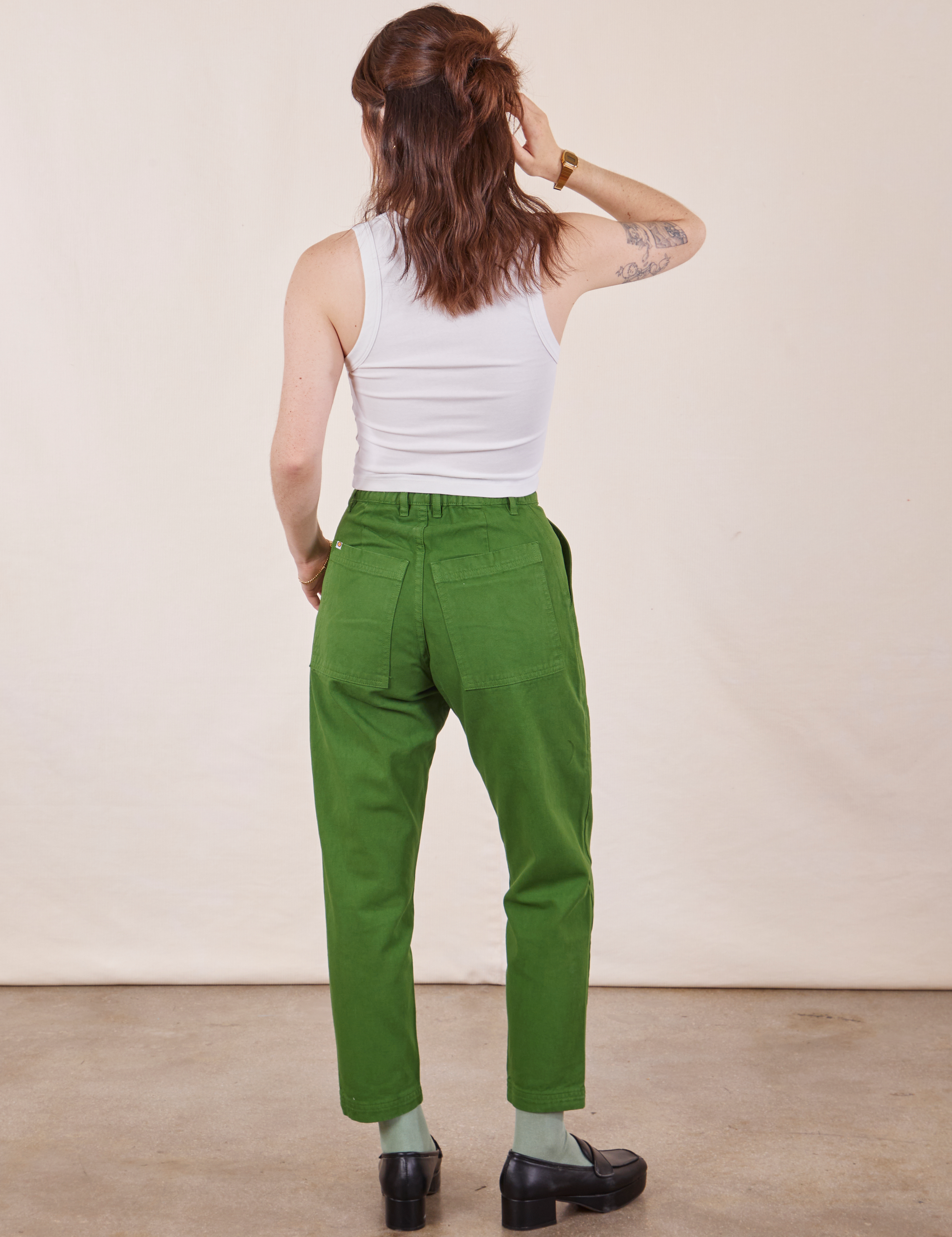 Back view of Petite Pencil Pants in Lawn Green and Cropped Tank Top in vintage tee off-white