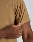Close up of Jr. Varsity Tee in Desert Brown sleeve on Isaac