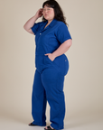 Angled front view of Short Sleeve Jumpsuit in Royal Blue on Ashley