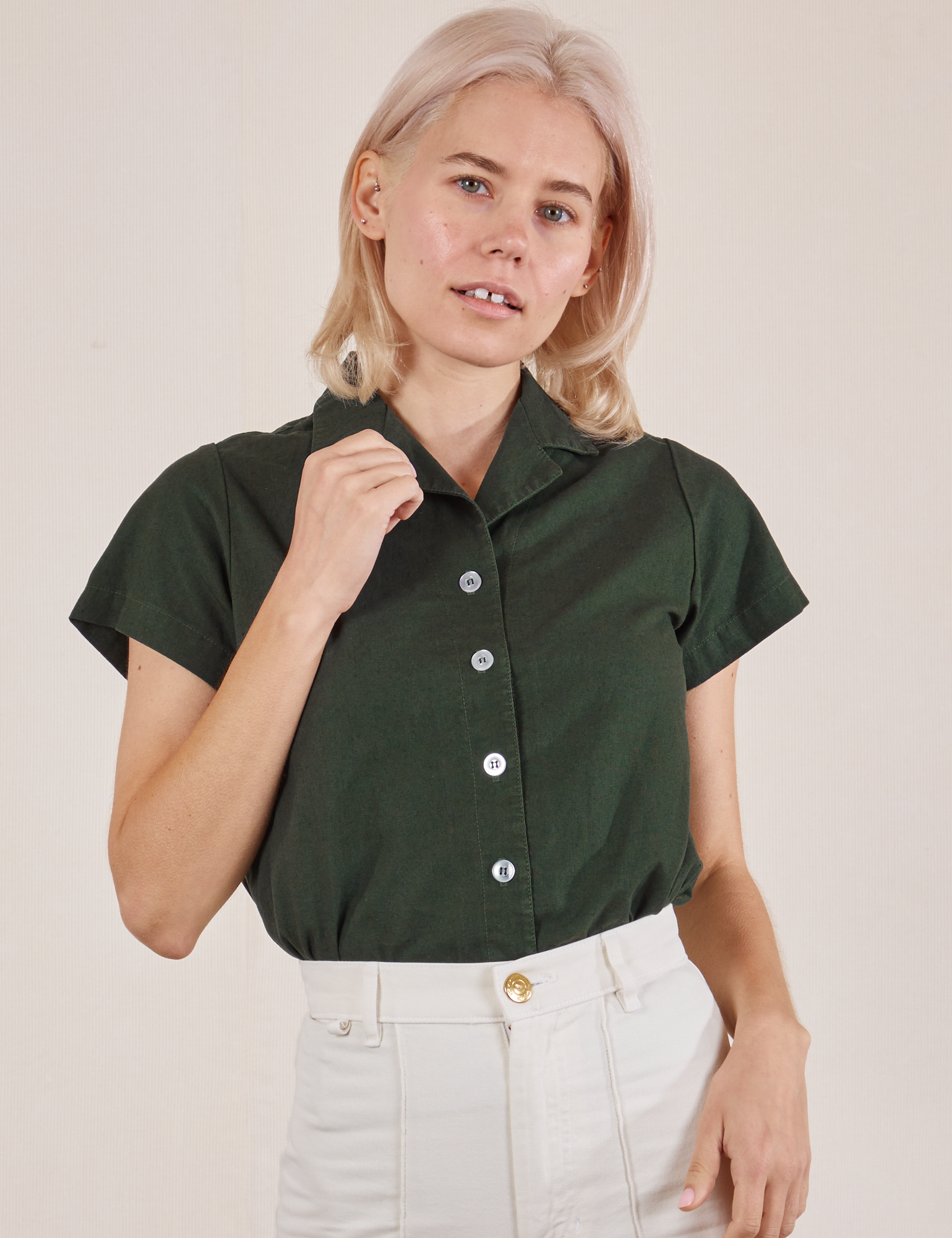 Madeline is wearing Pantry Button-Up in Swamp Green