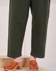Heavyweight Trousers in Swamp Green pant leg close up on Hana