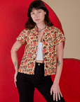 Alex is wearing Hot Stuff Print Pantry Button-Up