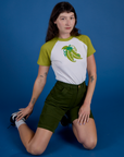 Produce Raglan Tee in Snap Peas worn by Alex