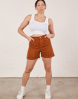 Tiara is 5’4” and wearing S Classic Work Shorts in Burnt Terracotta paired with Cropped Tank Top in vintage tee off-white