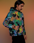 Angled front view of Oversized Hoodie in Rainbow Magic Waters on Anthony