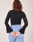 Back view of Bell Sleeve Top in Basic Black worn by Alex