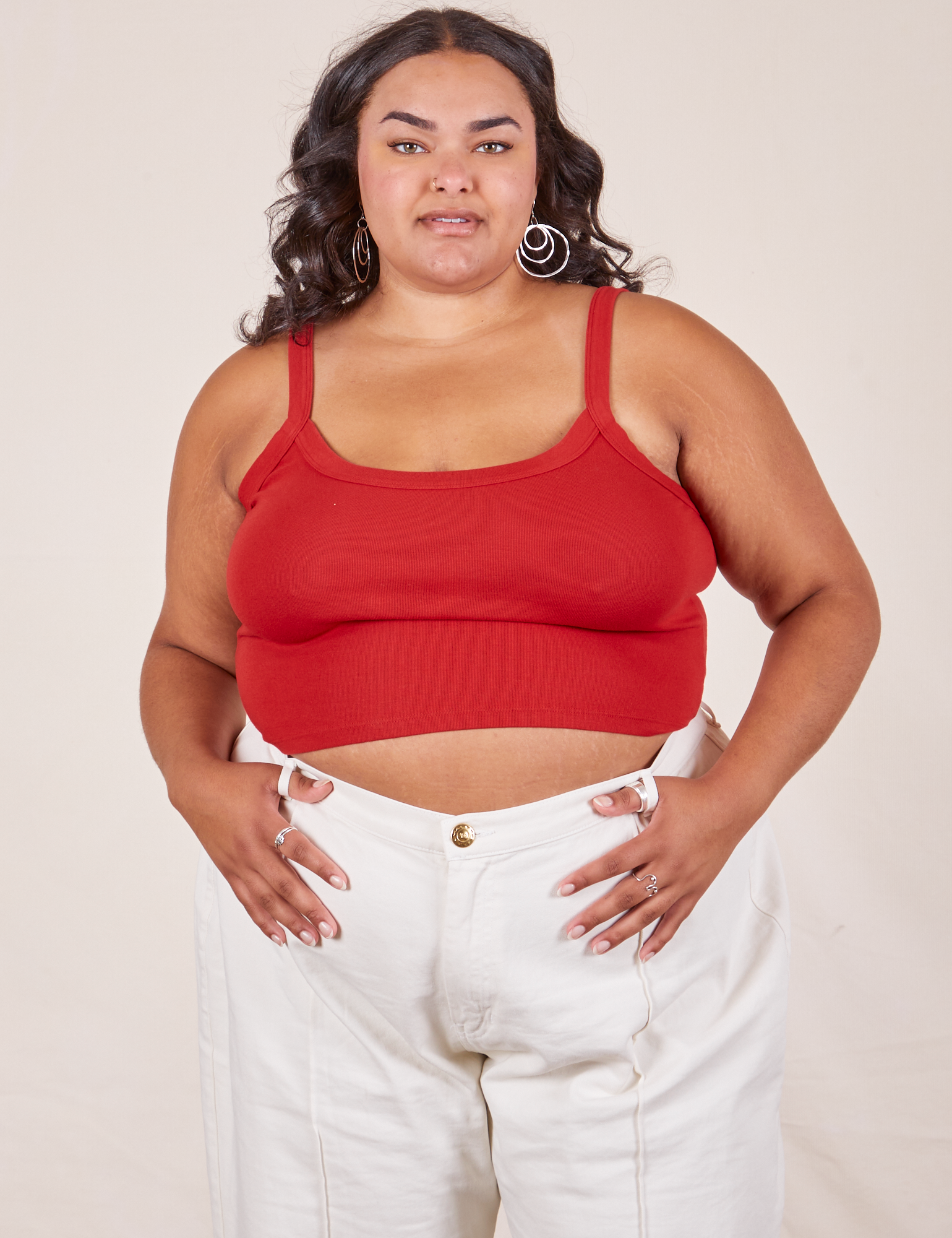 Alicia is 5&#39;9&quot; and wearing XL Cropped Cami in Mustang Red paired with vintage off-white Western Pants