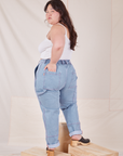 Back view of Carpenter Jeans in Light Wash worn by Ashley