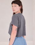 Cropped Burly Tee in Washed Grey angled back view on Alex