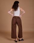 Drop Pocket Cargo Pants in Fudgesicle Brown back view on Alex