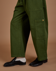 Drop Pocket Cargo Pants in Evergreen pant leg close up on Jerrod