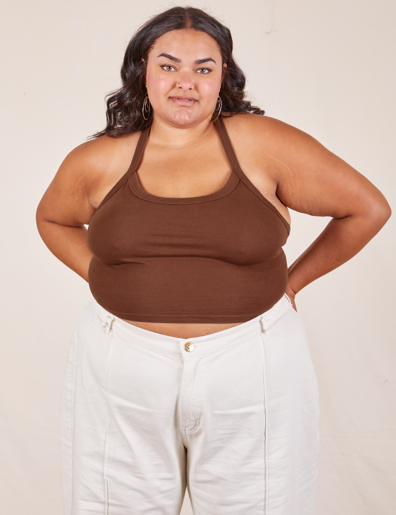 Alicia is 5&#39;9&quot; and wearing XL Halter Top in Fudgesicle Brown paired with vintage off-white Western Pants