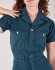 Heritage Short Sleeve Jumpsuit in Lagoon front close up on Alex