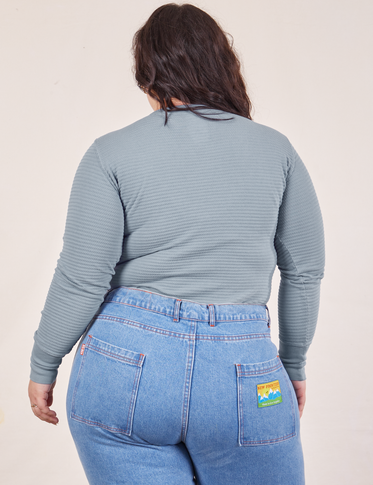 Back view of Honeycomb Thermal in Periwinkle worn by Ashley