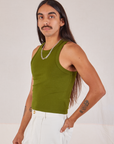 Racerback Tank in Summer Olive angled front view on Anthony