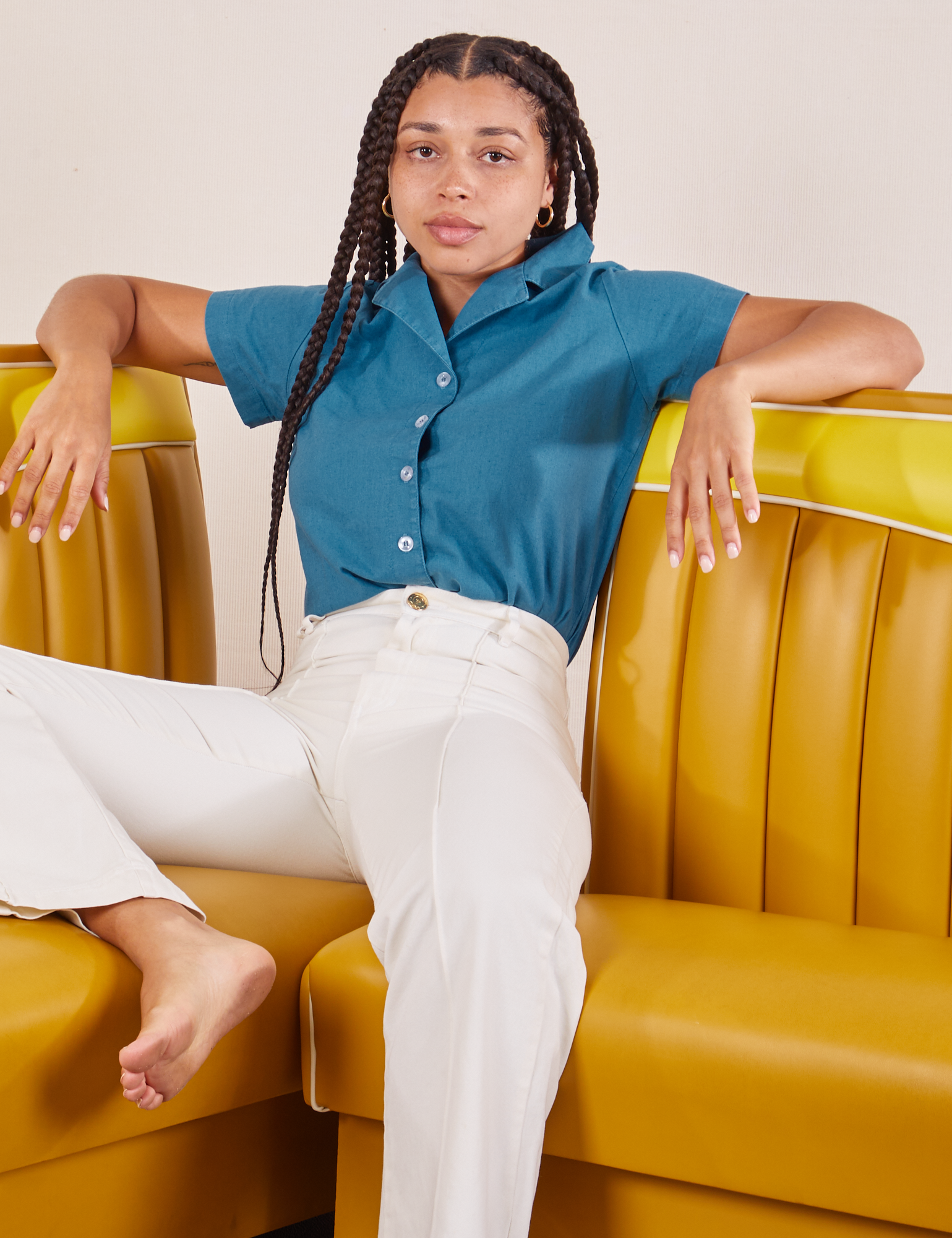 Gabi is wearing Pantry Button-Up in Marine Blue and vintage tee off-white Western Pants