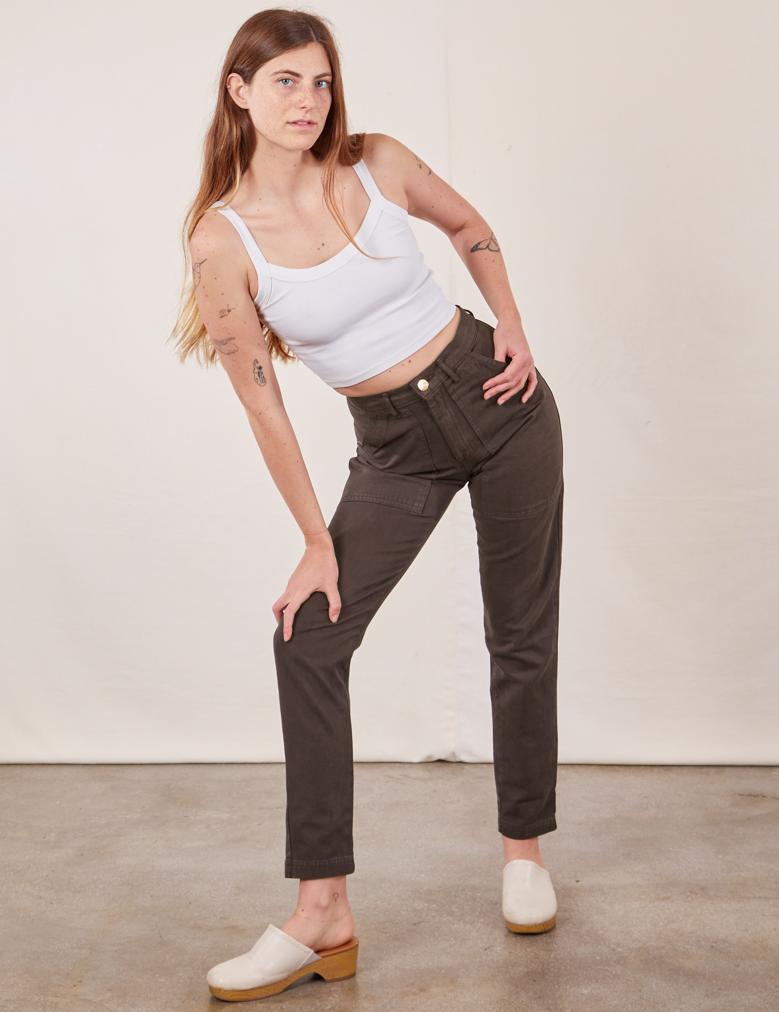 Scarlett is wearing Pencil Pants in Espresso Brown and Cropped Cami in vintage tee off-white