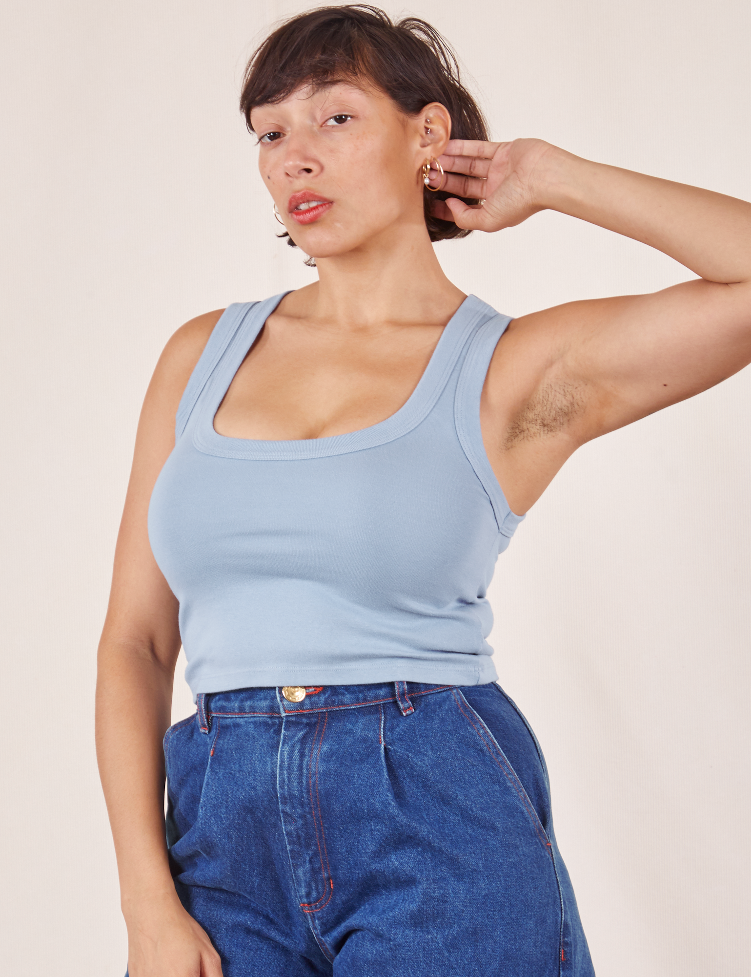 Tiara is 5&#39;4&#39; and wearing XS Cropped Tank Top in Periwinkle