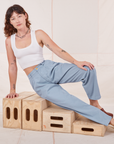 Alex is wearing Heavyweight Trousers in Periwinkle and vintage off-white Cropped Tank Top