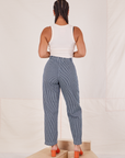 Back view of Denim Trouser Jeans in Railroad Stripe and Tank Top in vintage tee off-white on Gabi