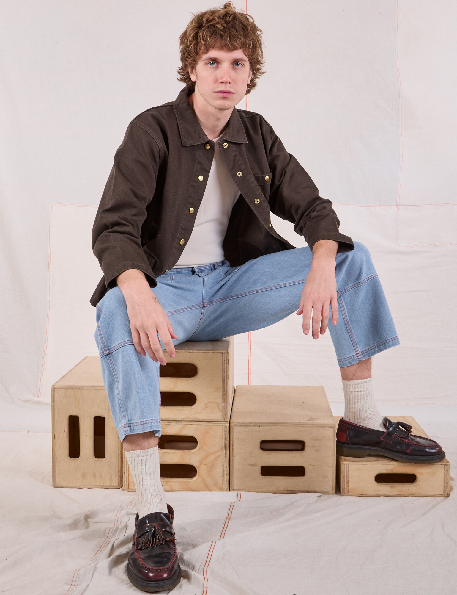 Denim Work Jacket in Espresso Brown and light wash Carpenter Jeans on Quinn
