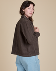 Angled back view of Denim Work Jacket in Espresso Brown on Alex