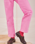 Carpenter Jeans in Bubblegum Pink pant leg close up on Jesse