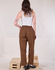 Checker Trousers in Brown & Black back view on Alex