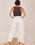 Back view of Heavyweight Trousers in Vintage Tee Off-White and espresso brown Cropped Tank Top worn by Tiara.