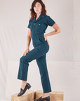 Heritage Short Sleeve Jumpsuit in Lagoon side view on Alex
