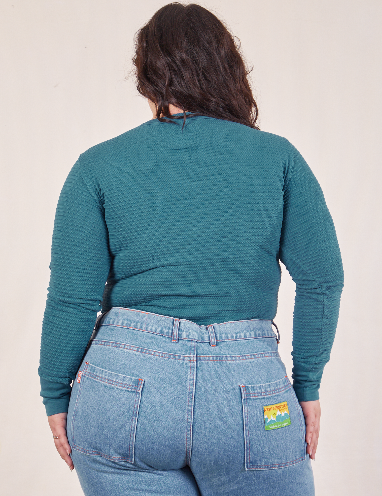 Back view of Honeycomb Thermal in Marine Blue worn by Ashley